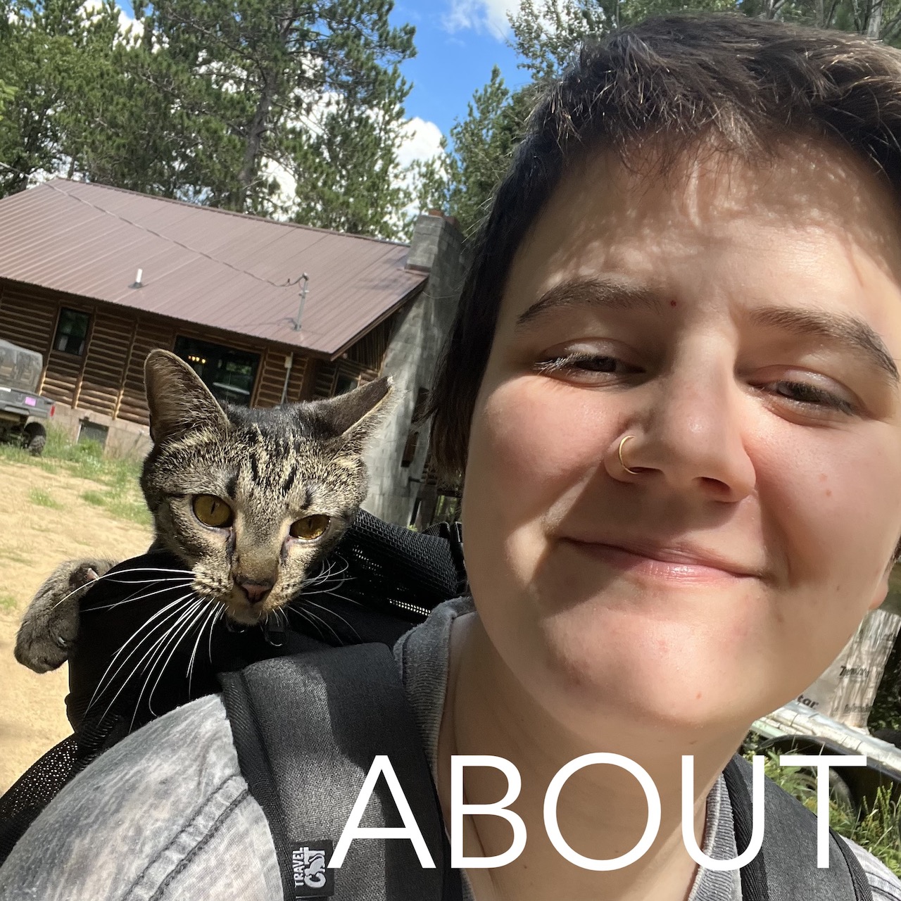 picture of me carrying my cat in his backpack carrier